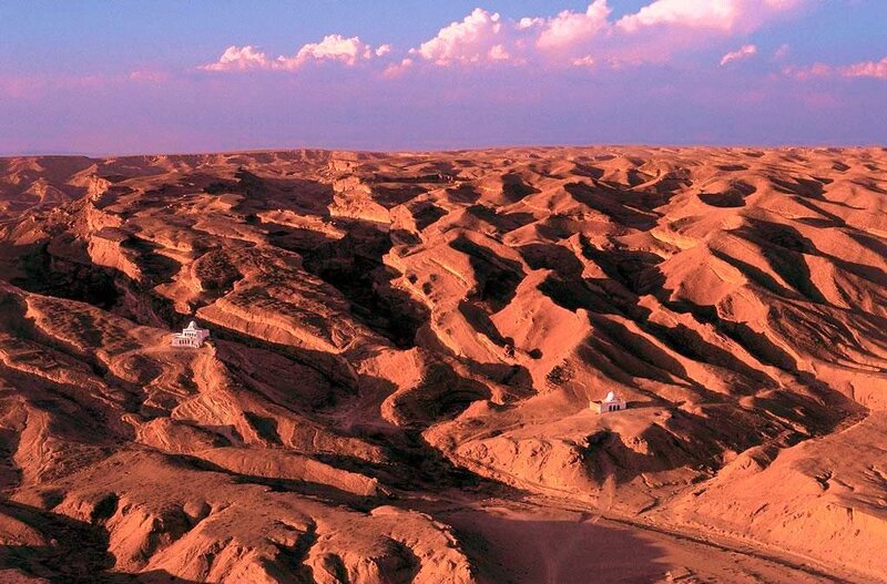 desert landscape with observatories