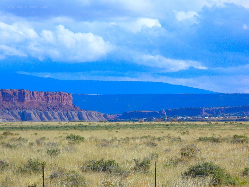 Desert landscape with red rock formations