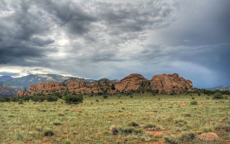 Desert landscape with storm clouds