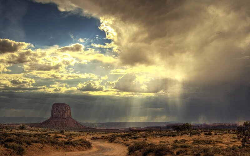 Desert landscape with storm
