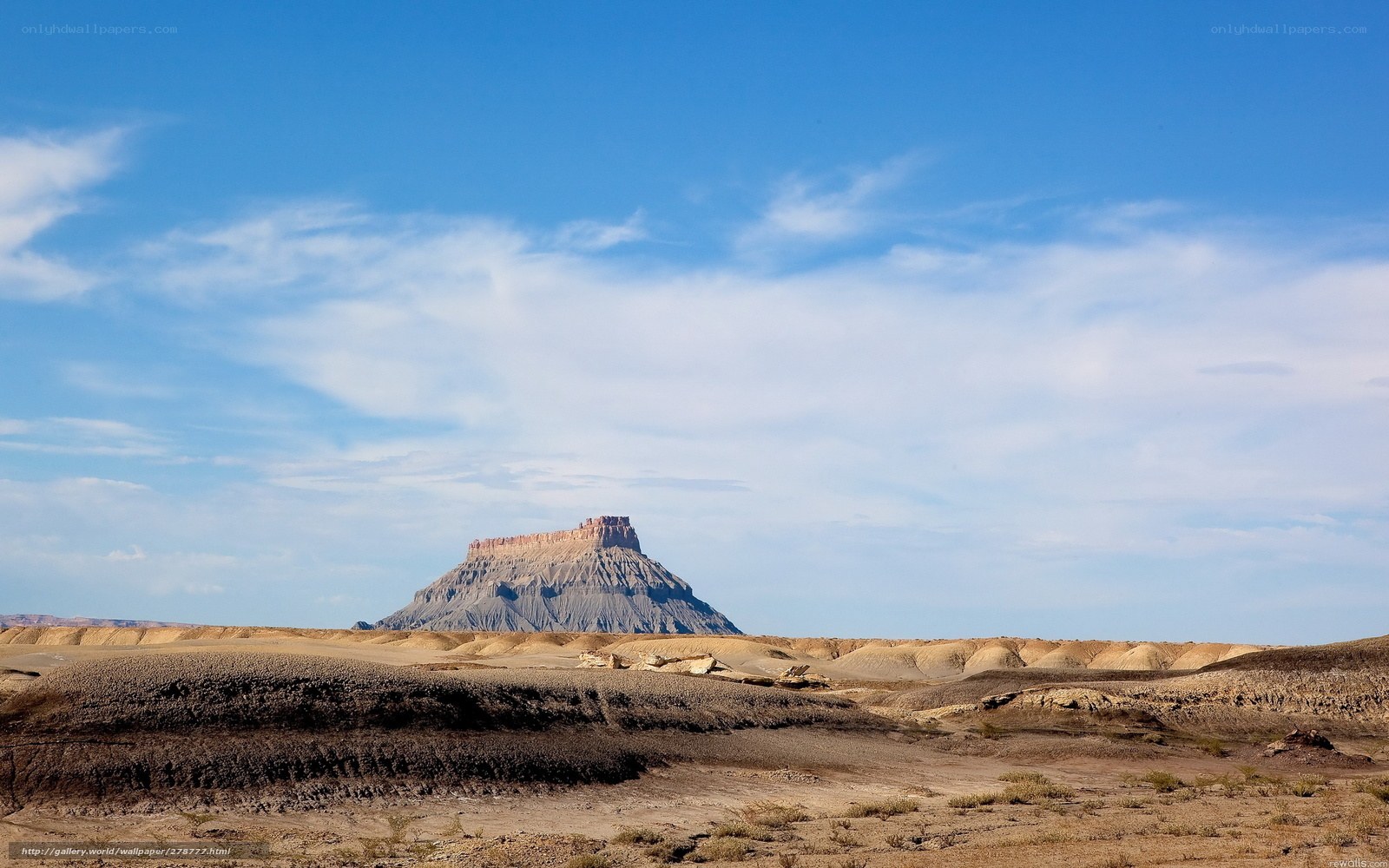 Desert mesa under blue sky