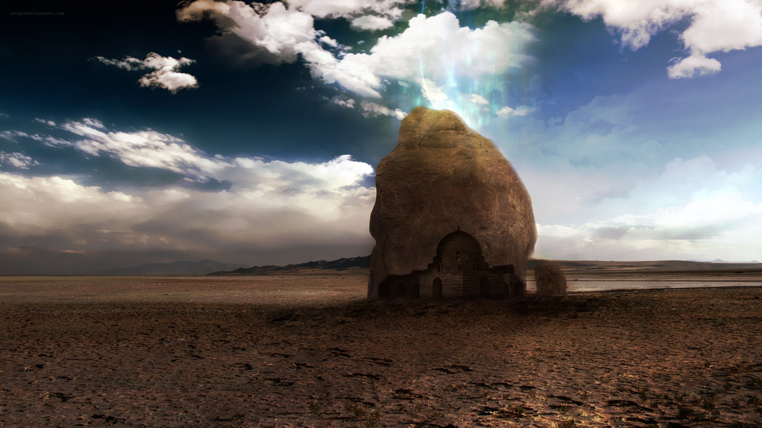 Desert monolith with glowing light