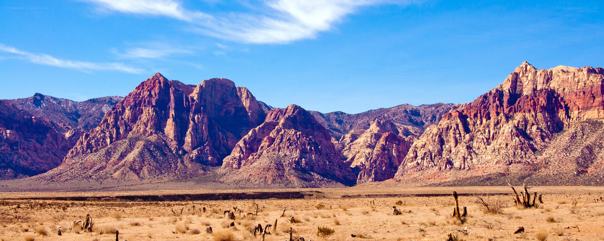 desert mountains under blue sky
