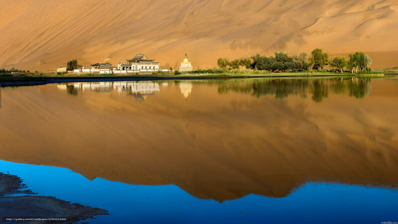 Desert oasis with temple reflection