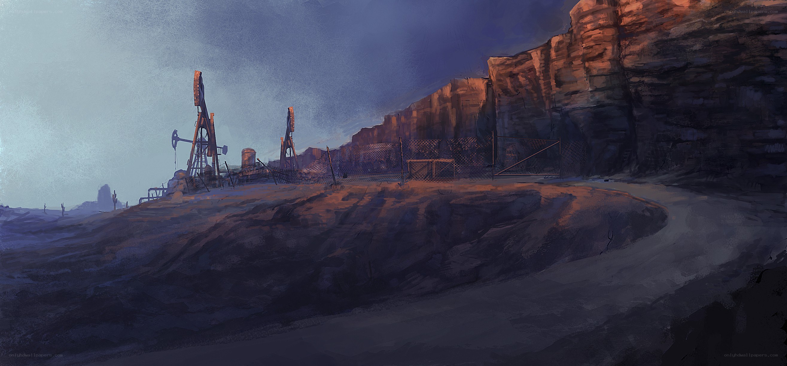 Desert oil field at dusk