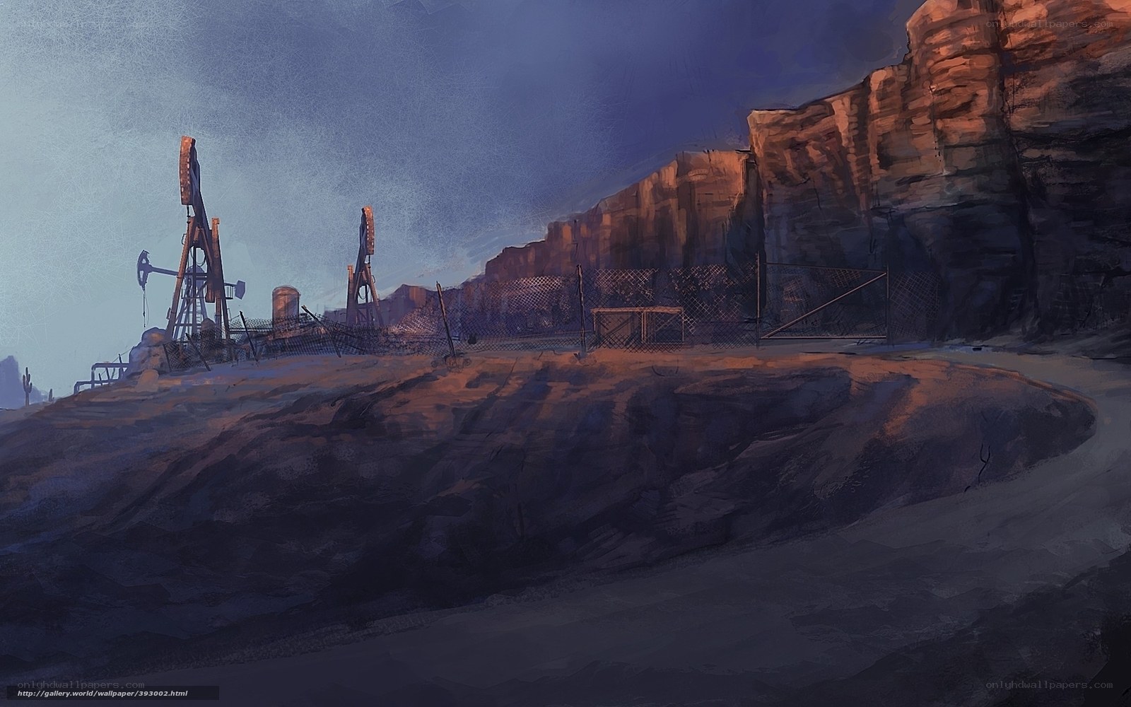 Desert oil field at dusk