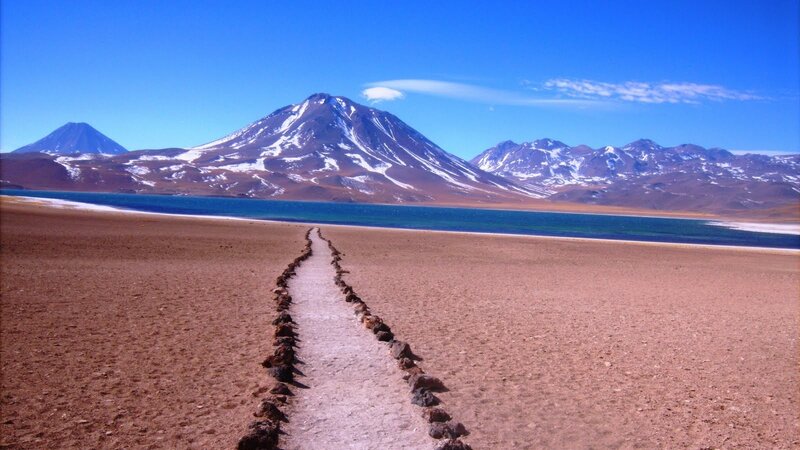 Desert path to mountain lake