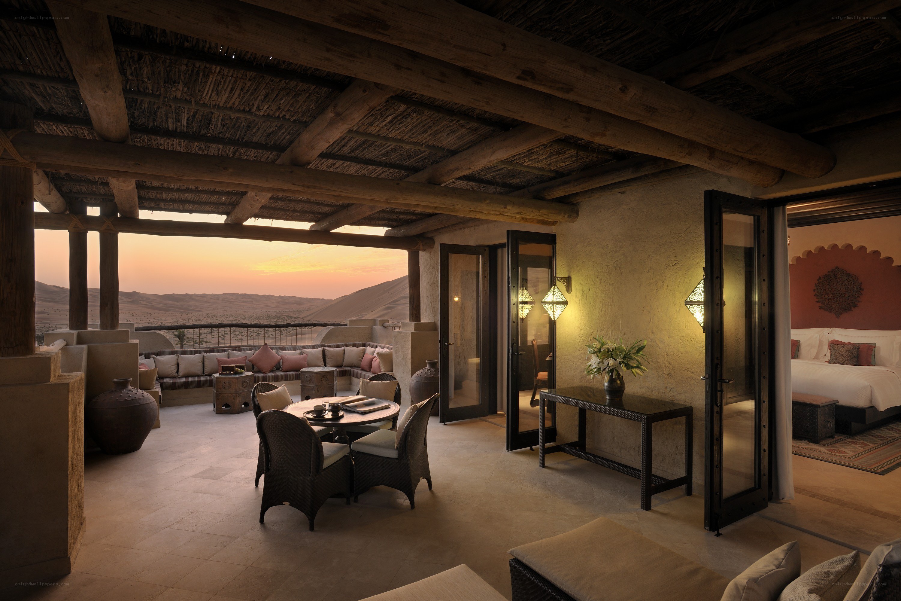 Desert resort terrace at sunset