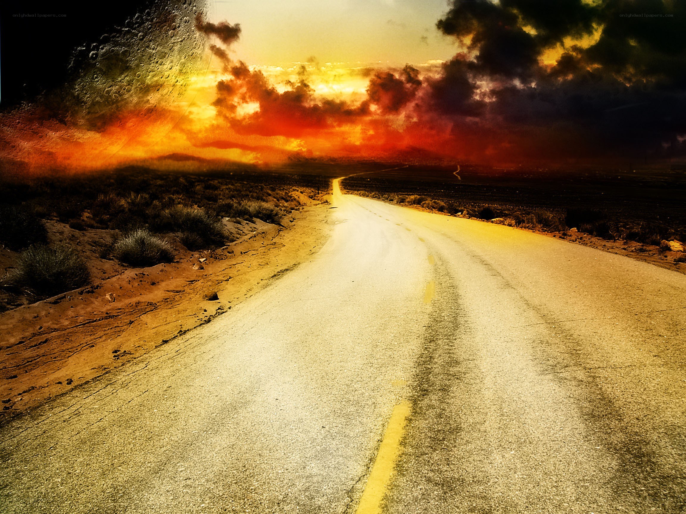 Desert road at sunset