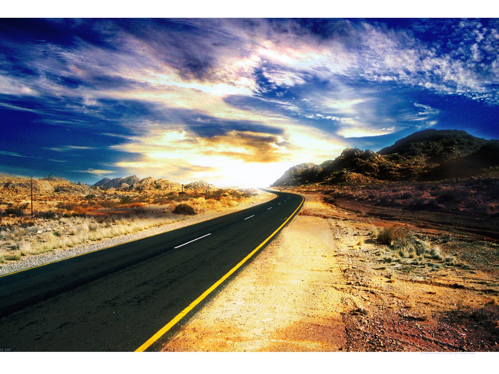 Desert road at sunset