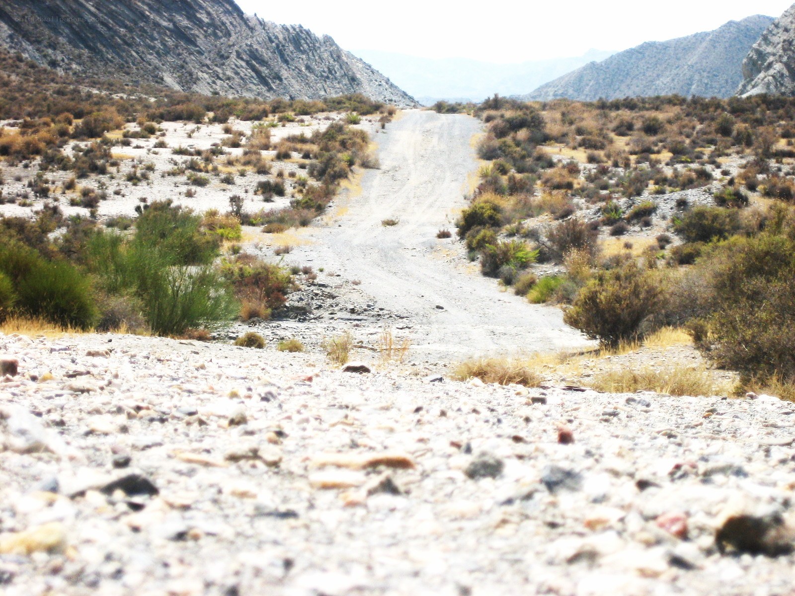 Desert road in mountain valley