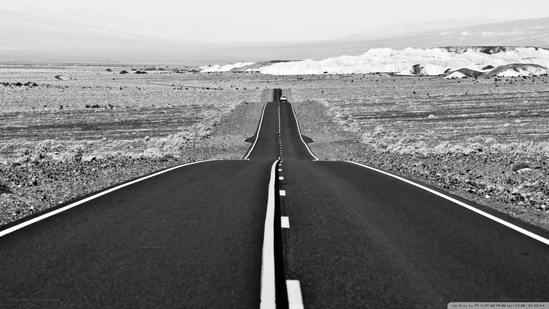 Desert road stretching into distance