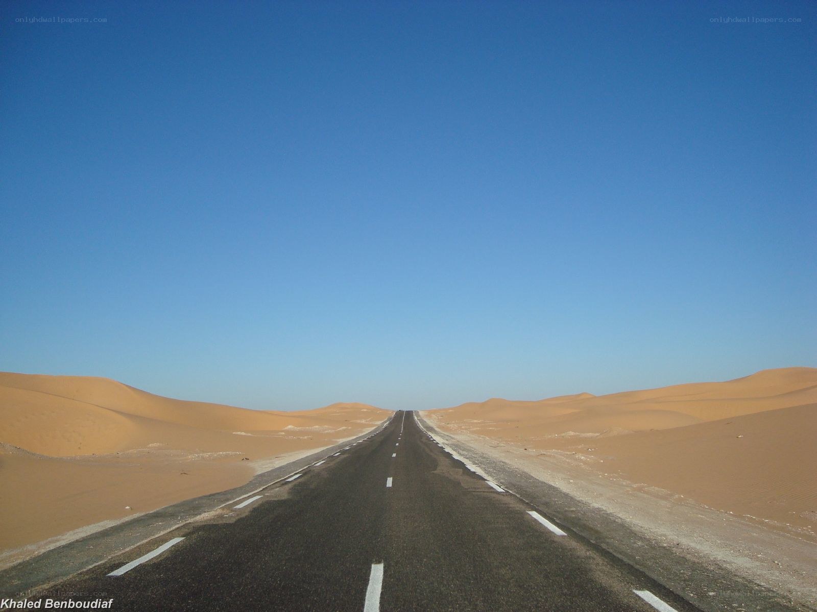 Desert road stretching into the horizon