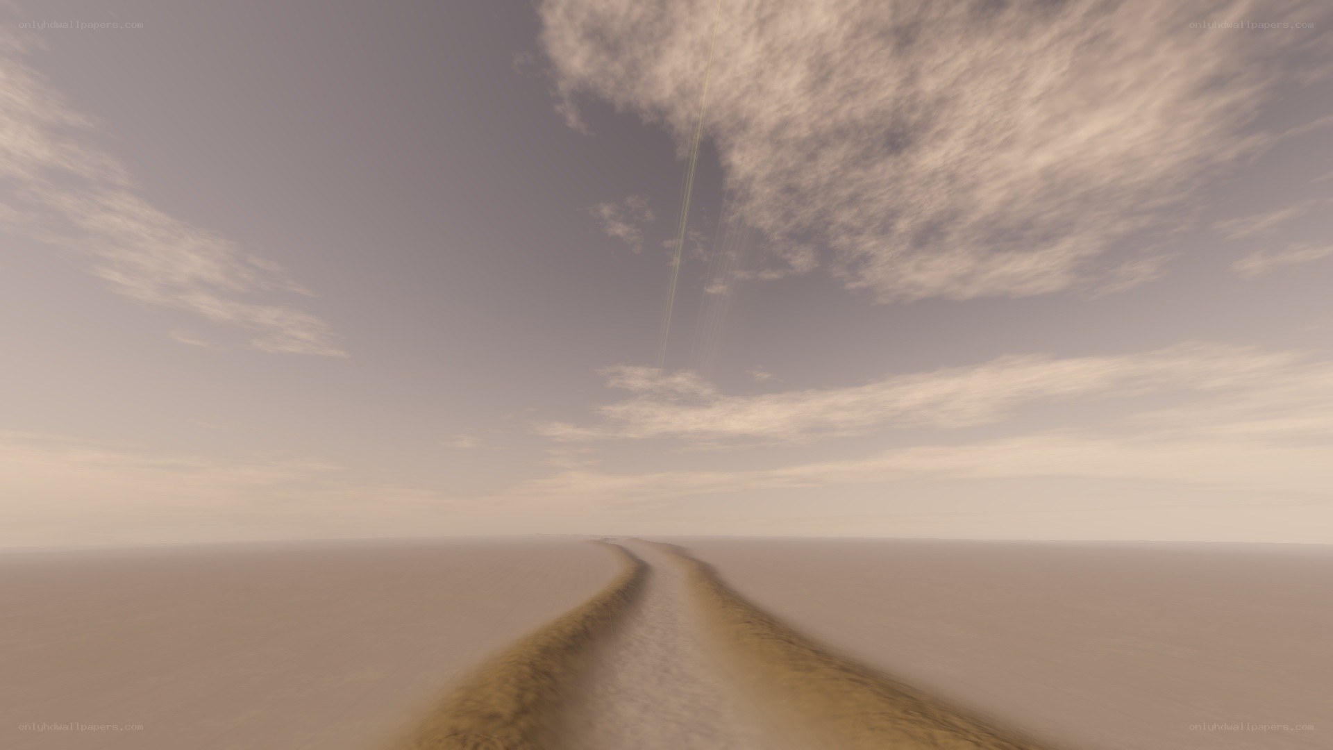 desert road under cloudy sky