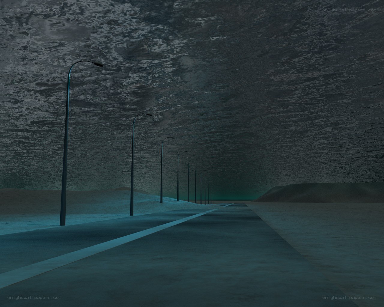 desert road under dark sky