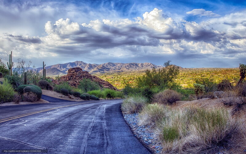 Desert road with mountains