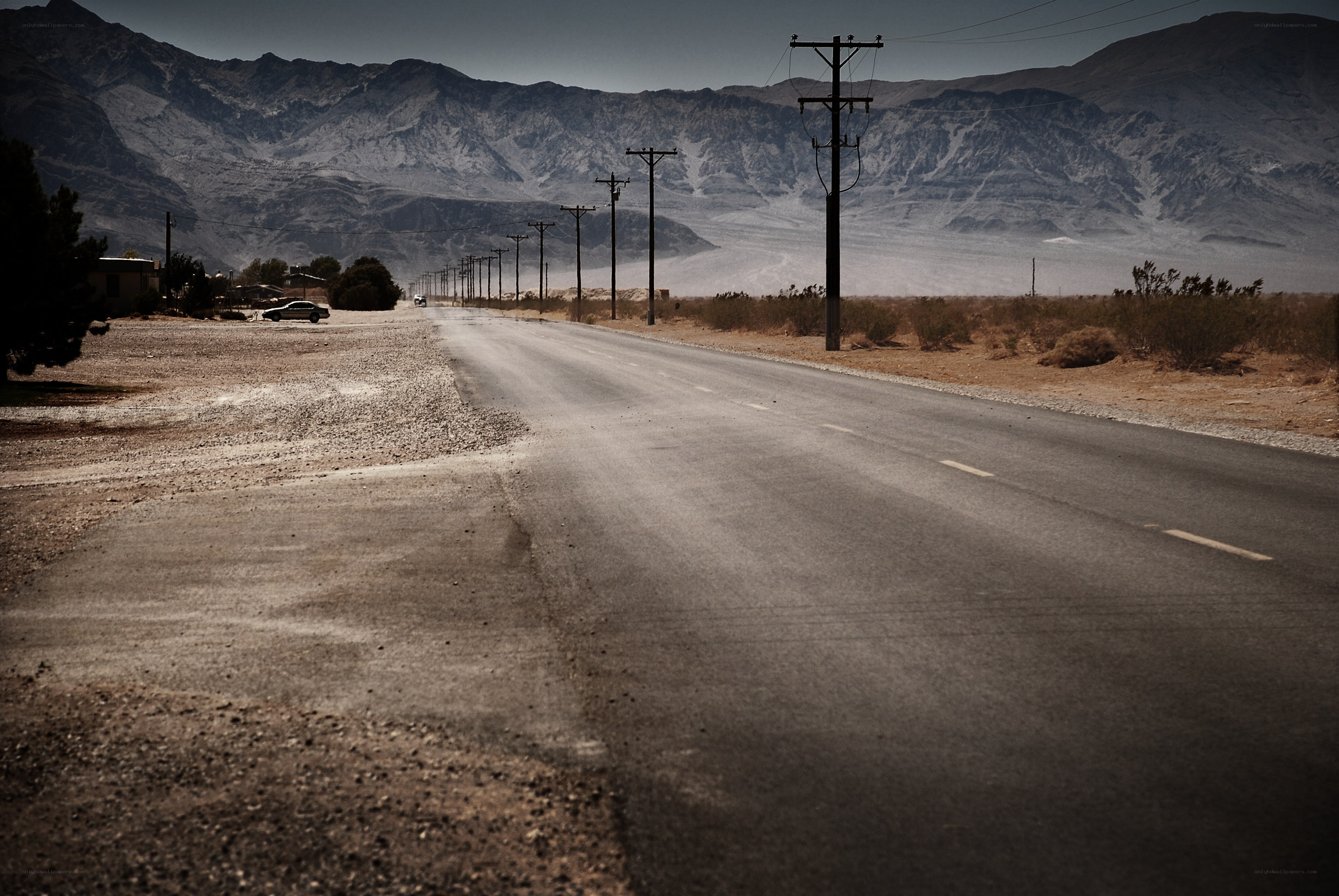 Desert road with mountains