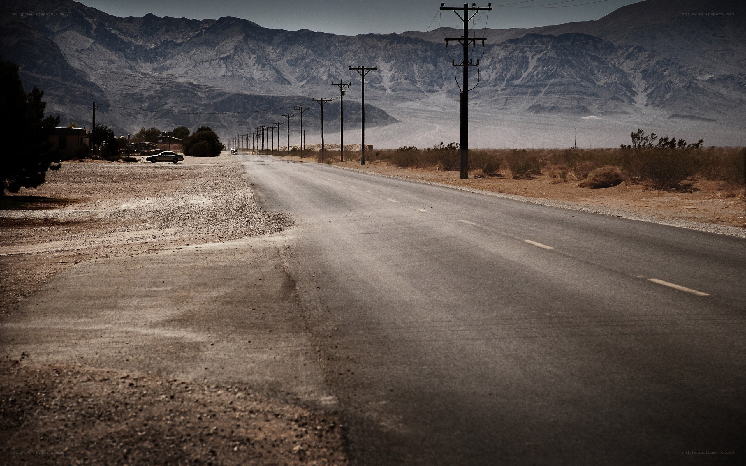 Desert road with mountains