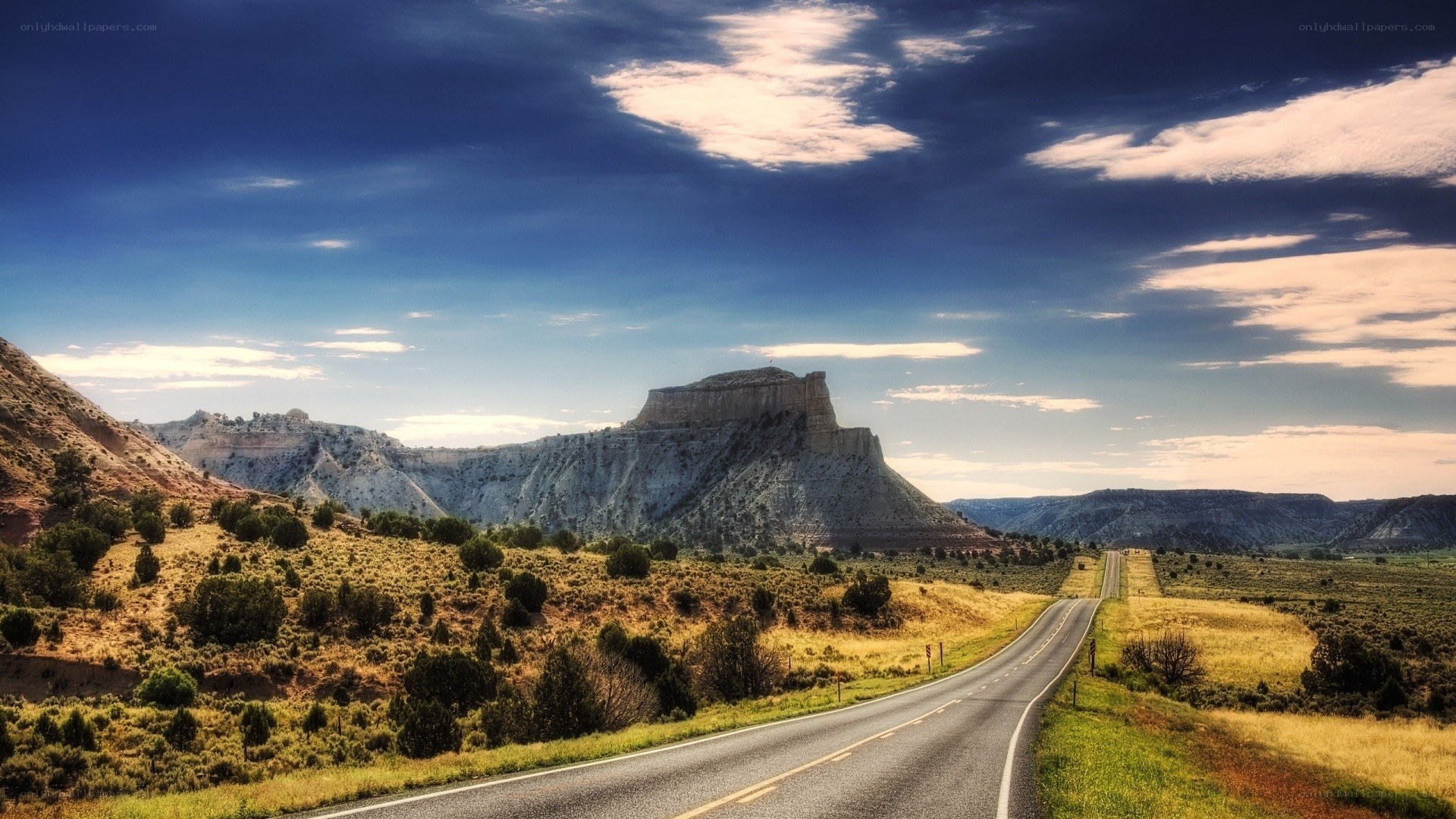 Desert road with rock formation