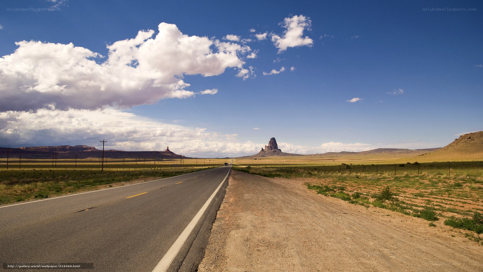 Desert road with rock formations