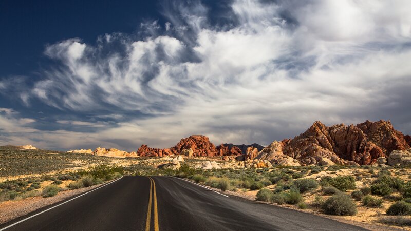 Desert Road with Rock Formations — Blue, Dramatic