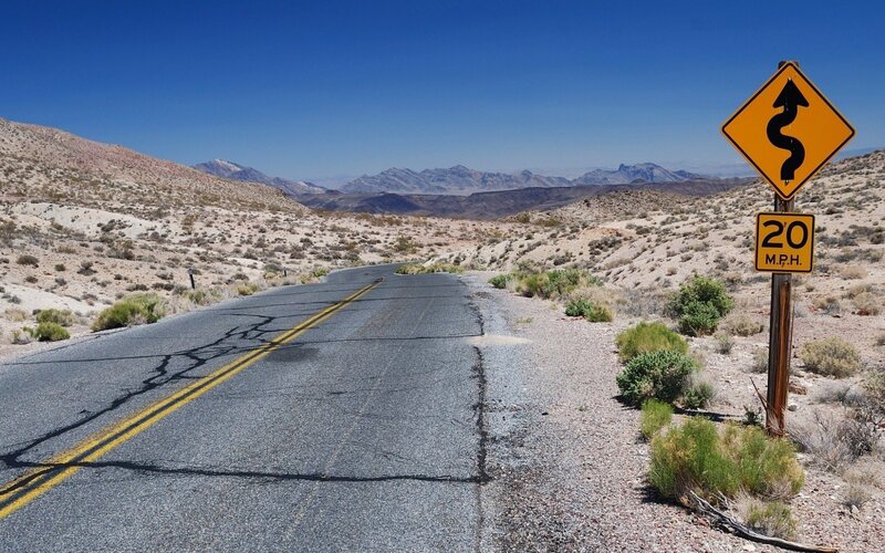 Desert Road with Signs