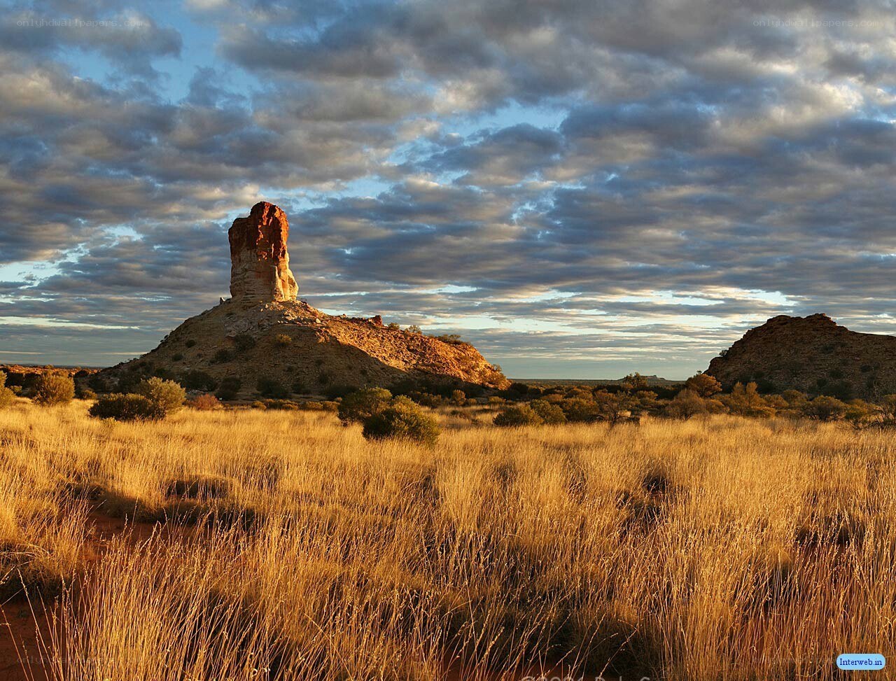 Desert rock formation at sunset