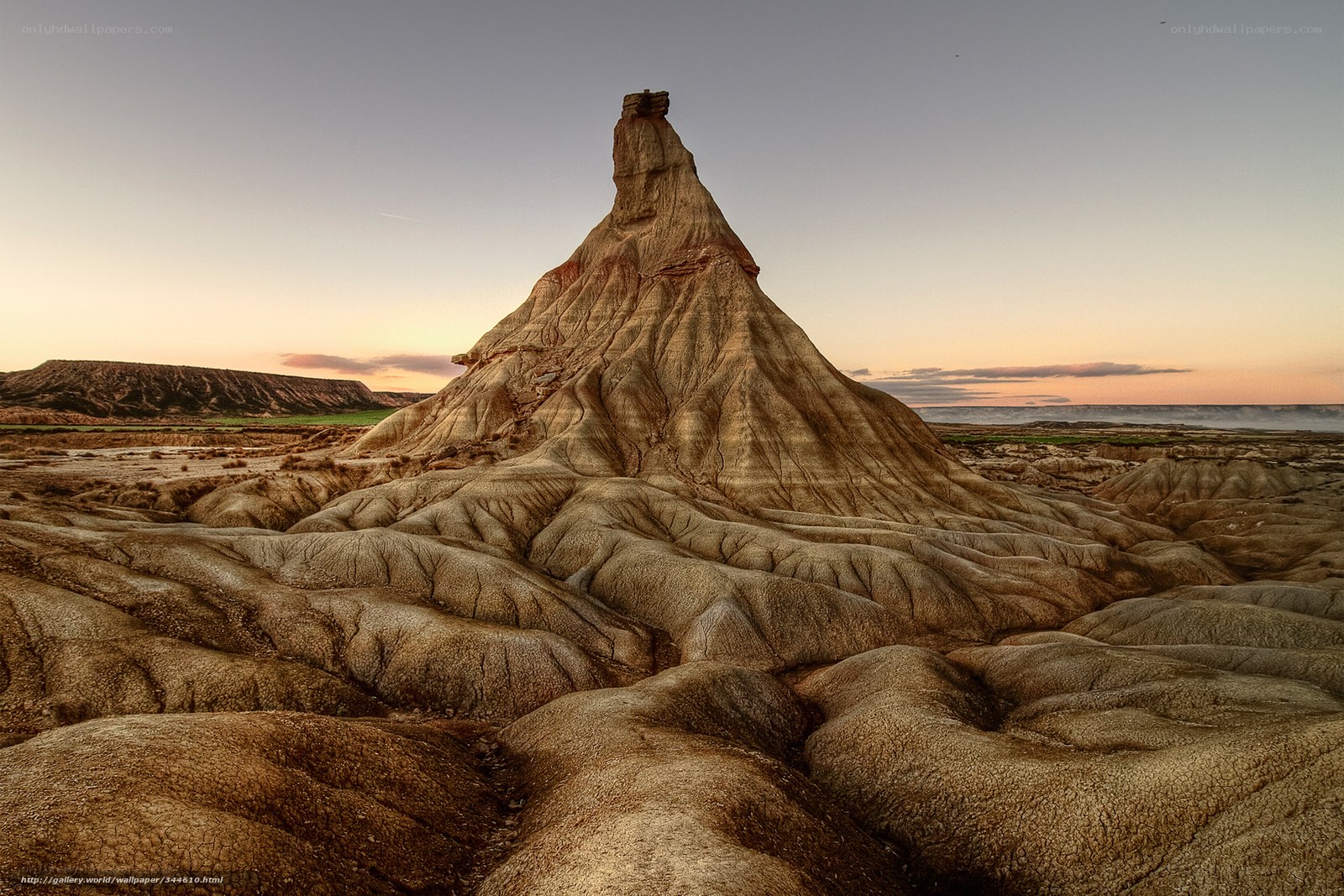 Desert rock formation at sunset