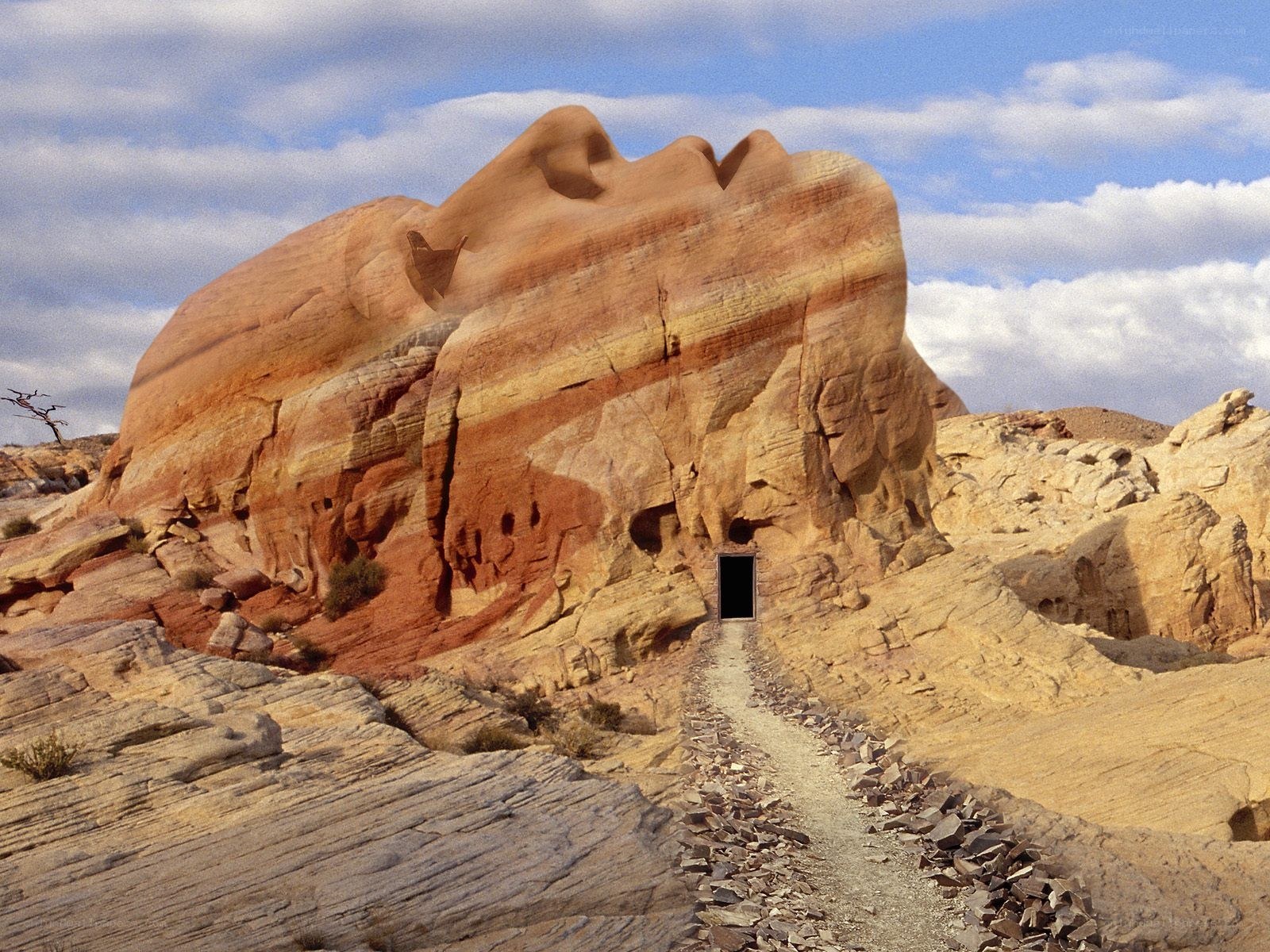Desert rock formation with door