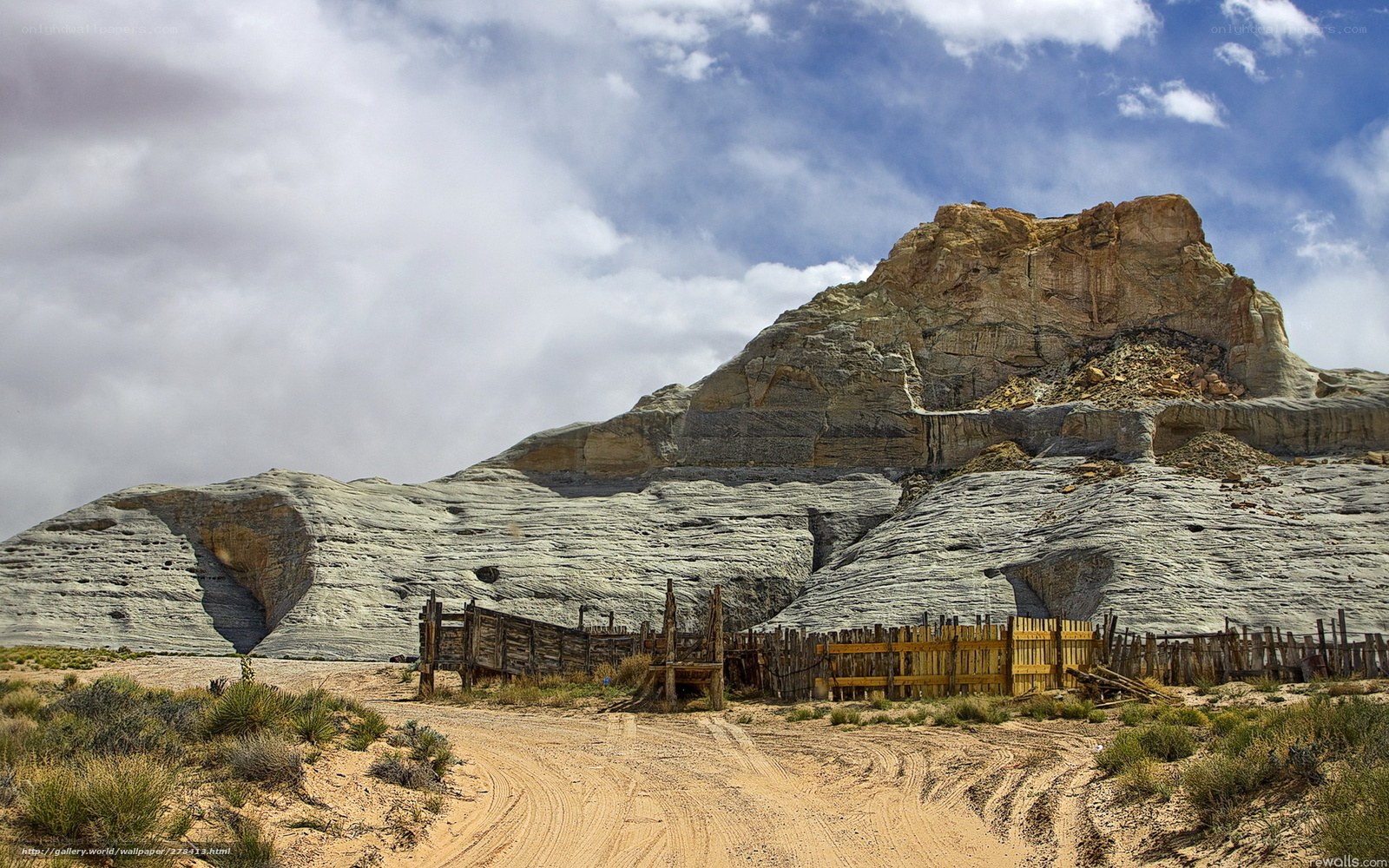 Desert rock formation with wooden fence