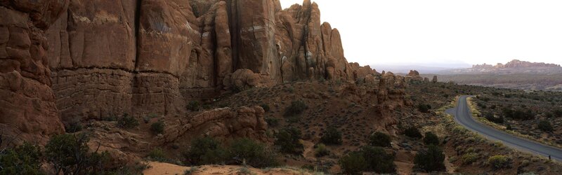 Desert rock formations and winding road