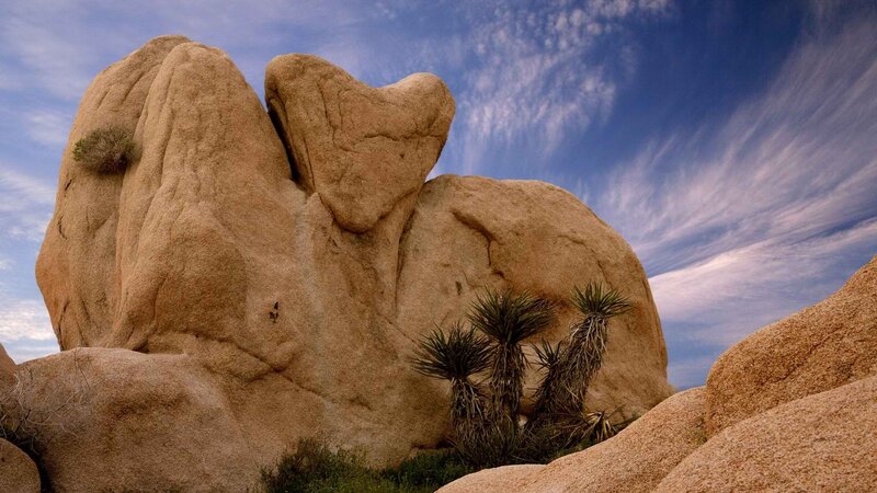 Desert rock formations under blue sky