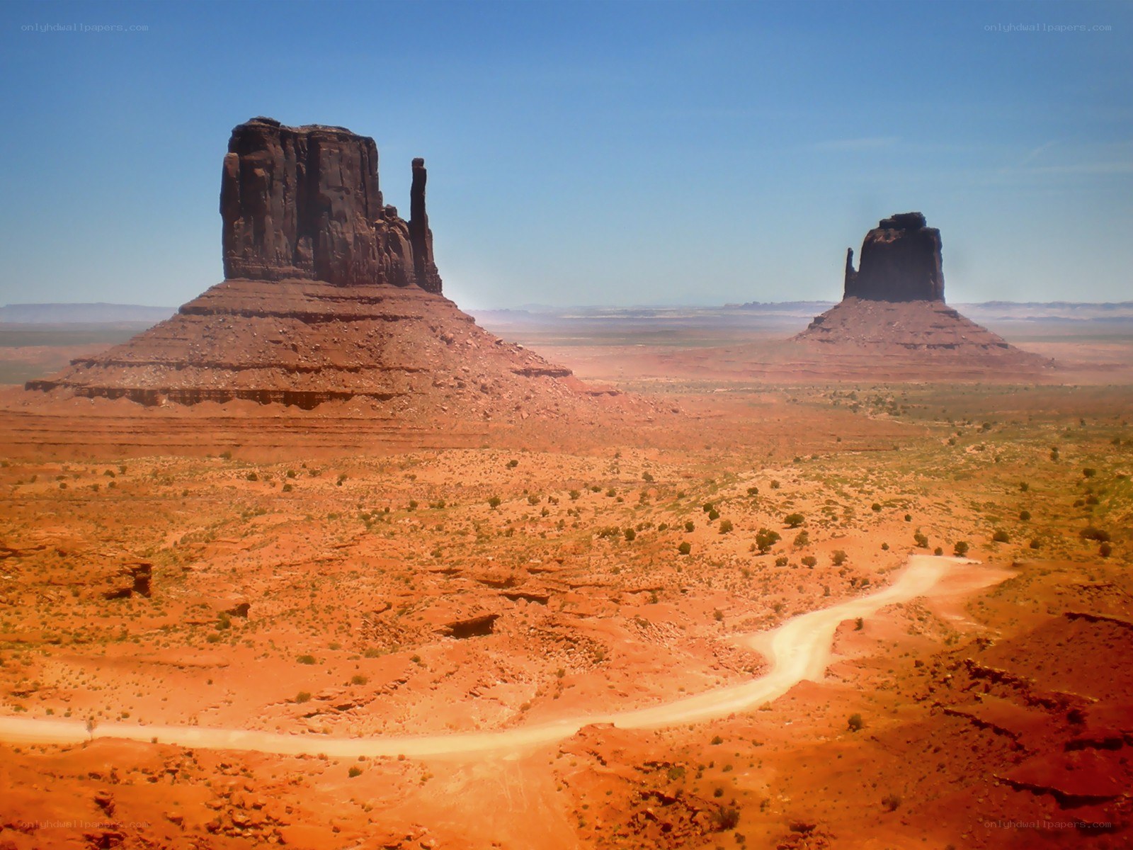 Desert rock formations under blue sky