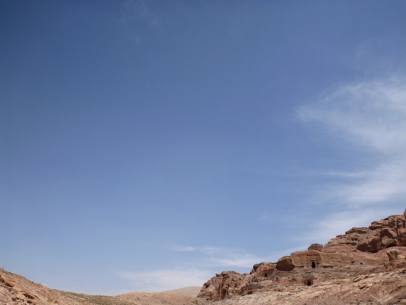 Desert rock formations under blue sky