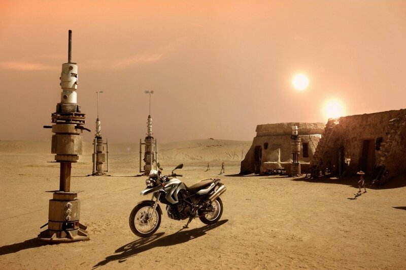 Desert settlement with motorcycle
