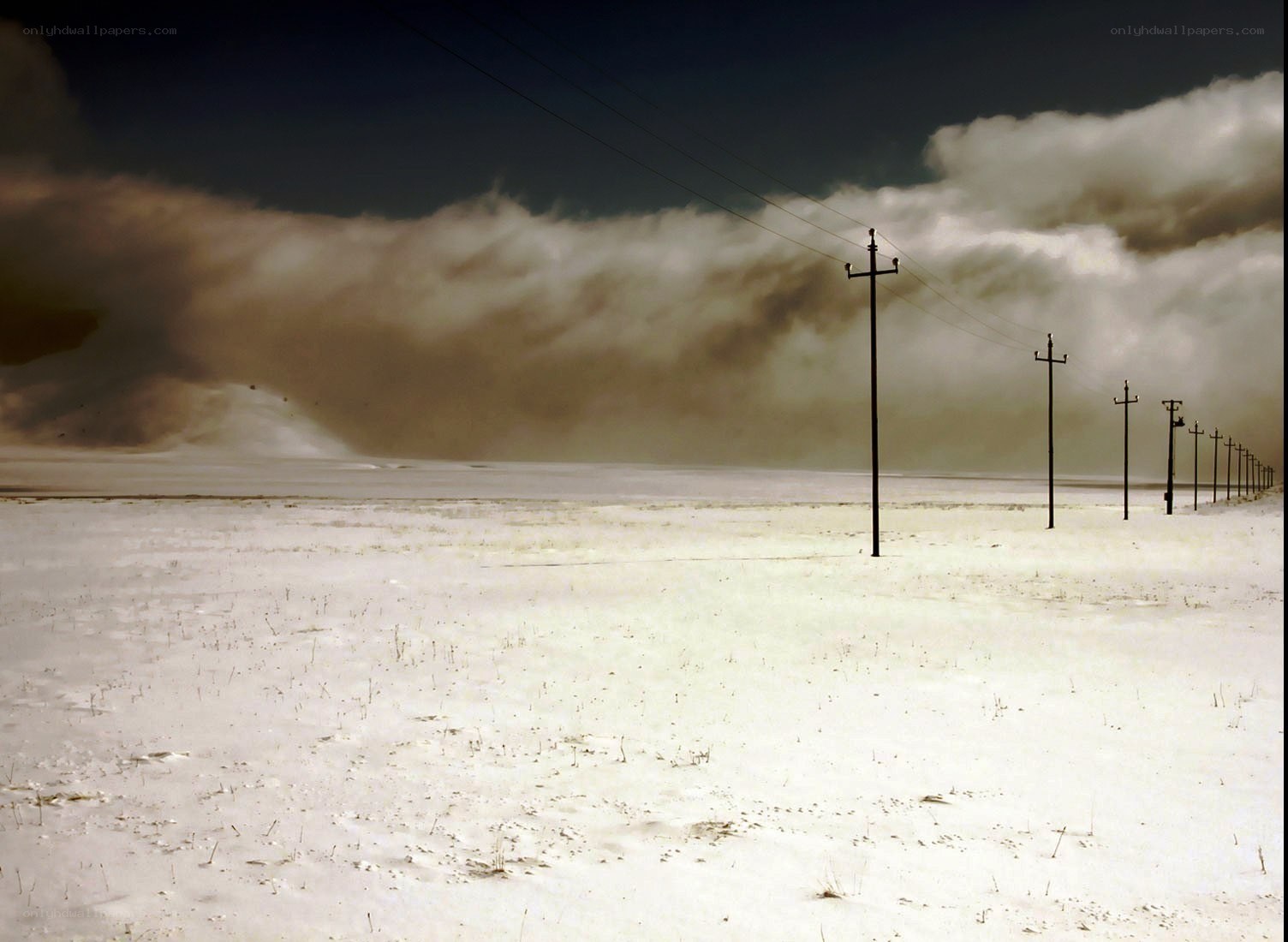 Desert storm with power lines