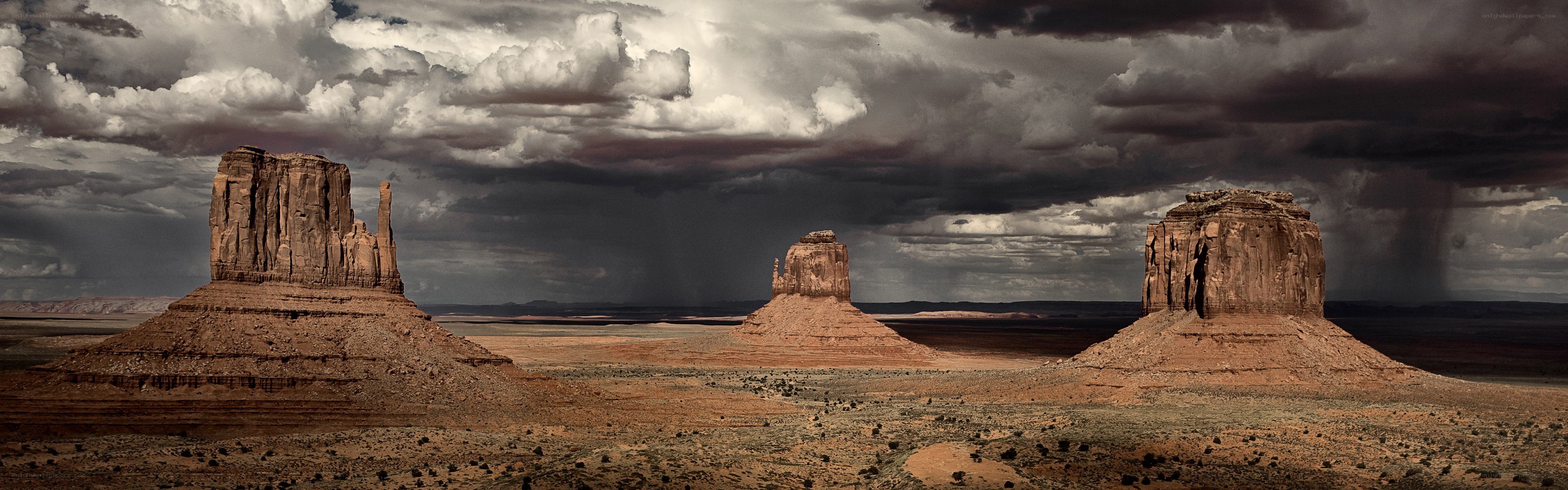 Desert storm with rock formations