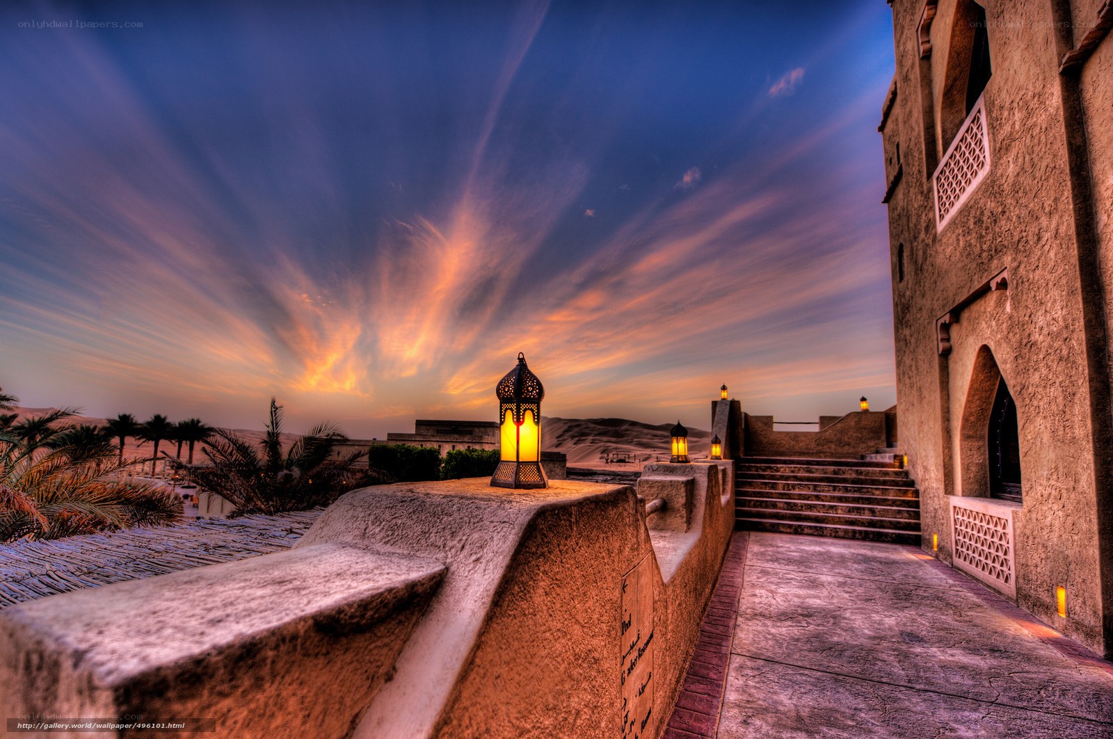 Desert sunset at a traditional building