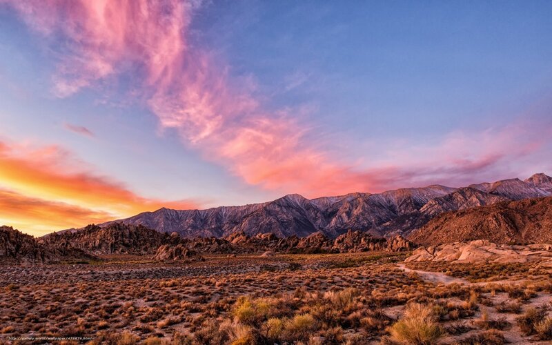 Desert sunset with pink clouds