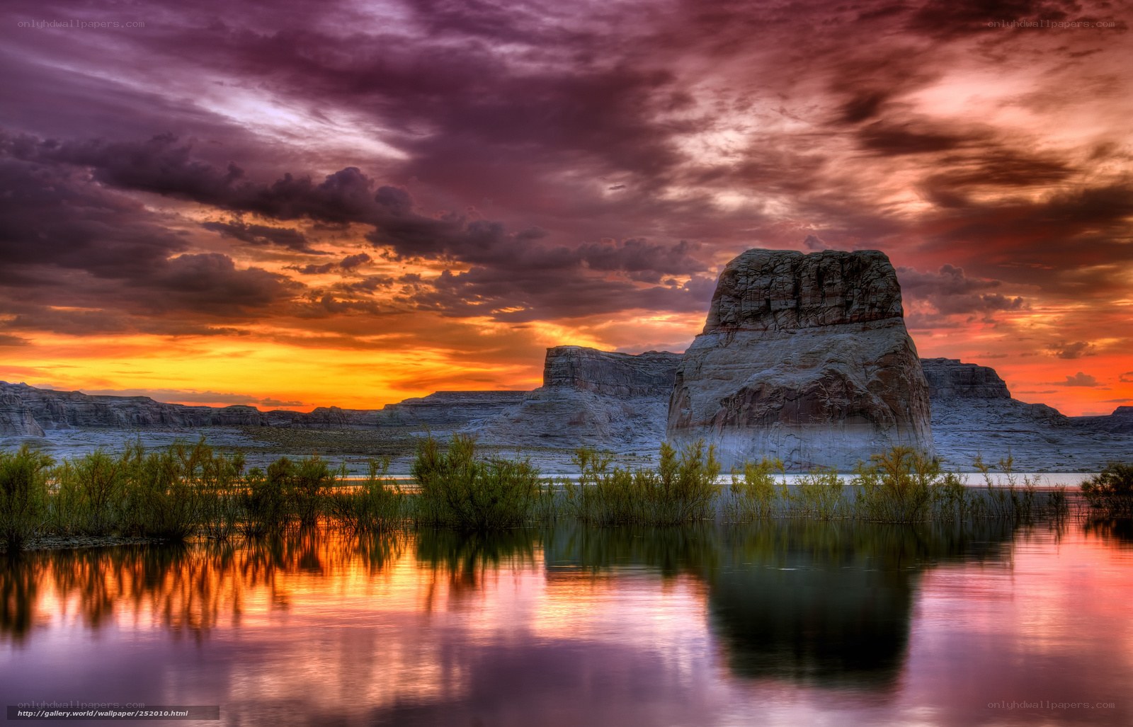 Desert sunset with rock formation