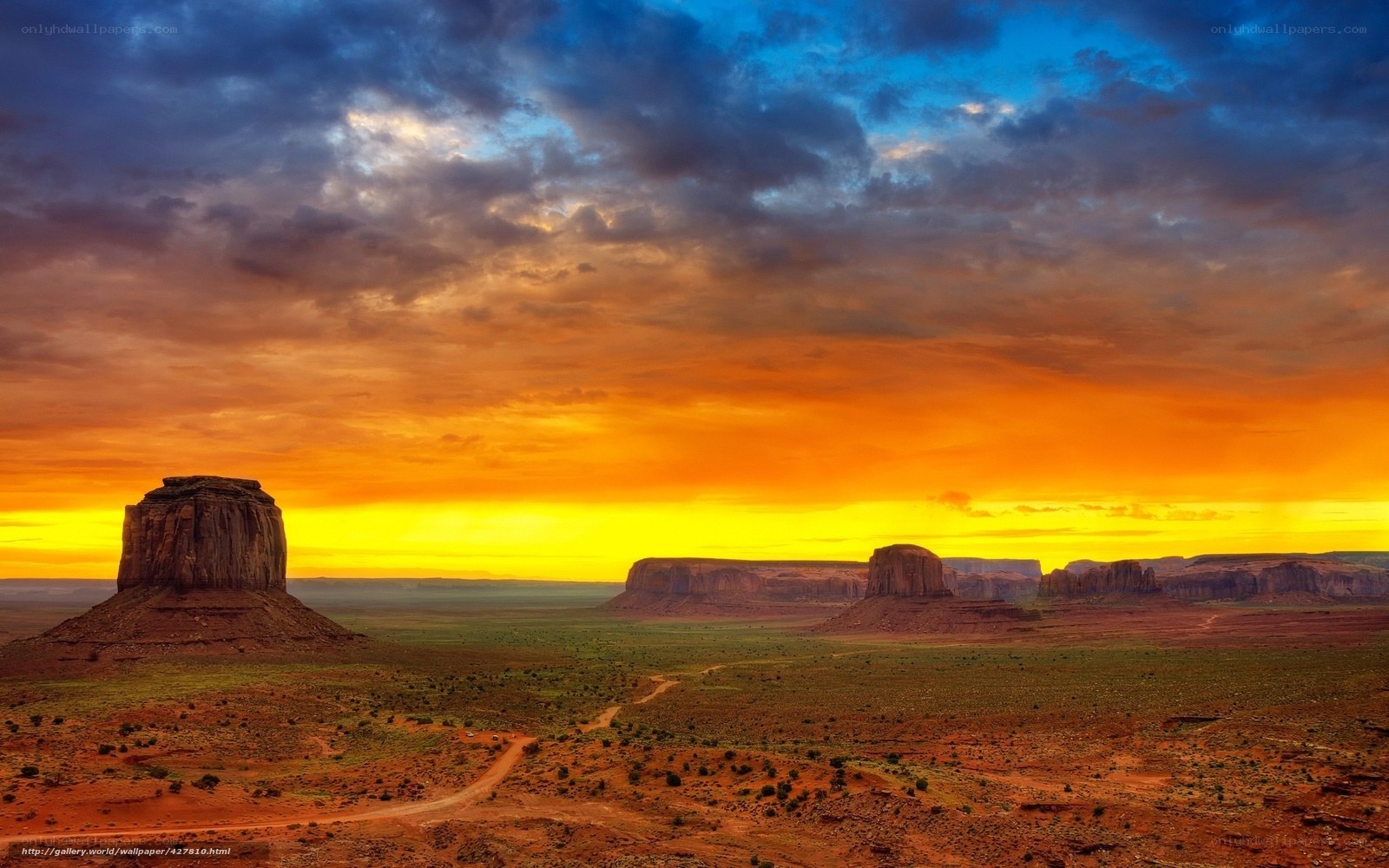 Desert sunset with rock formations