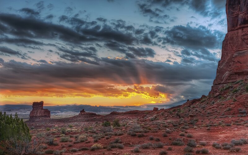 Desert sunset with rock formations