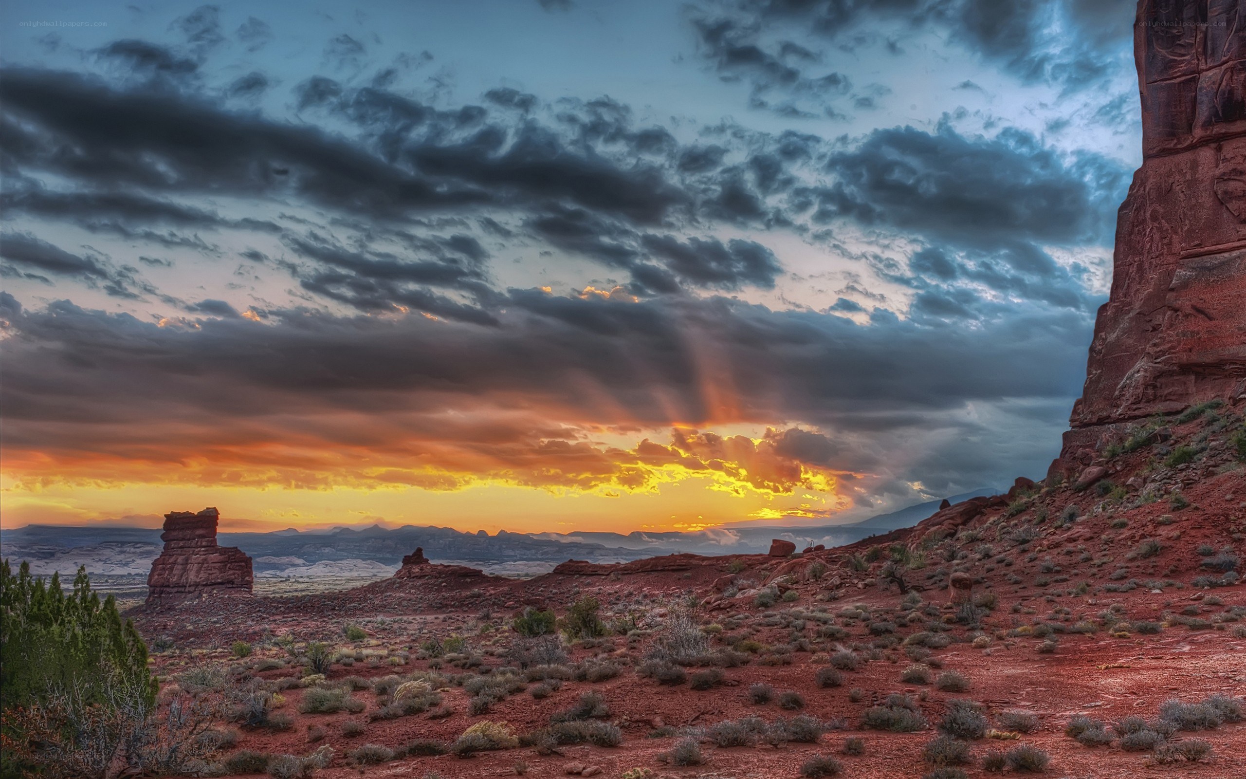 Desert sunset with rock formations