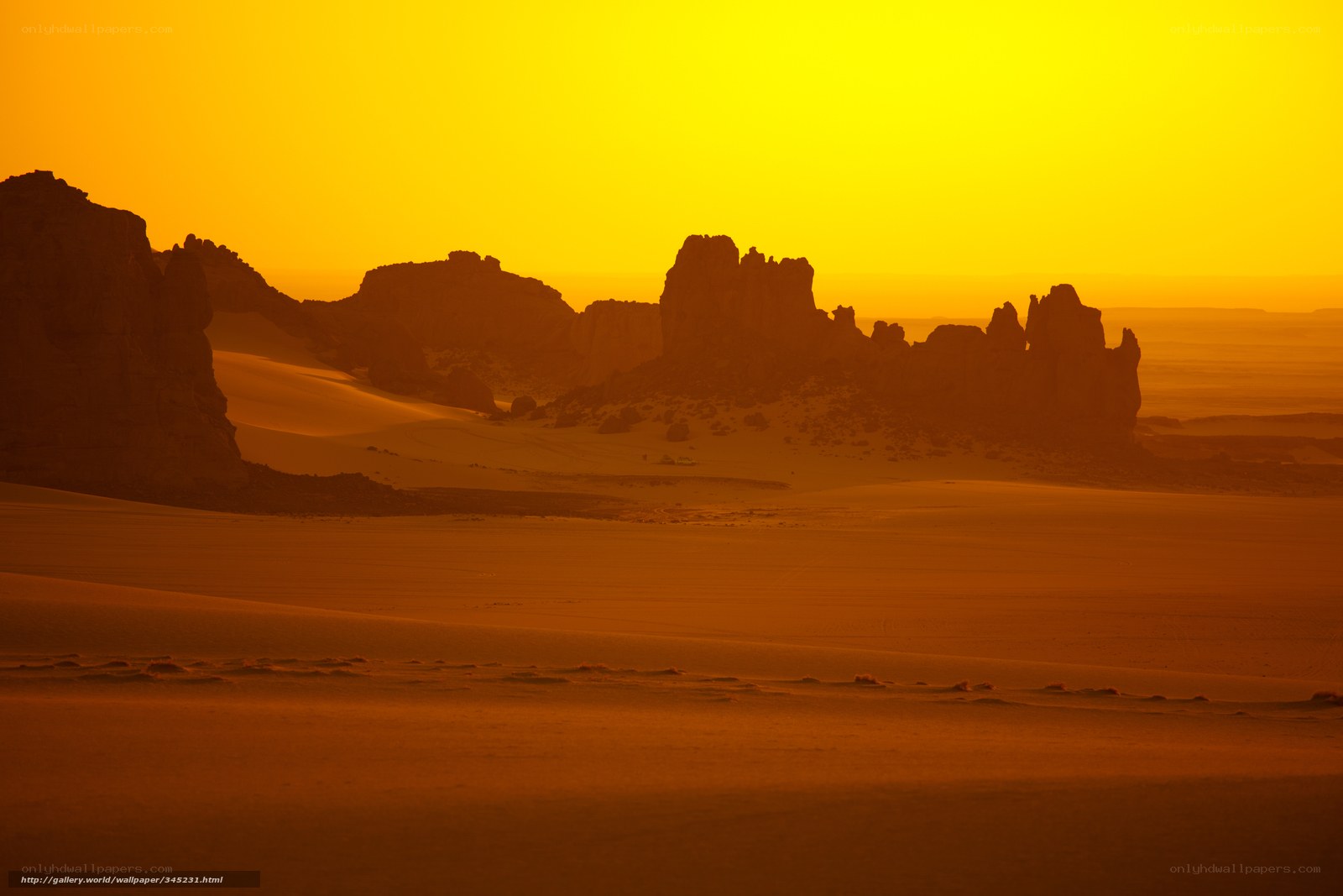 Desert sunset with rock formations