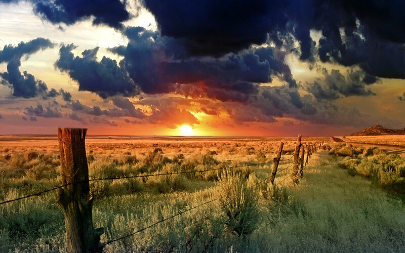 Desert sunset with storm clouds