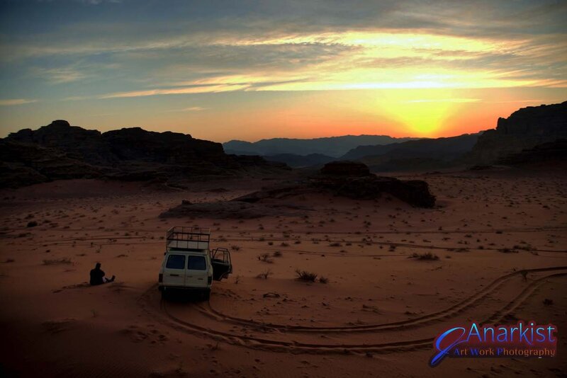 Desert sunset with van