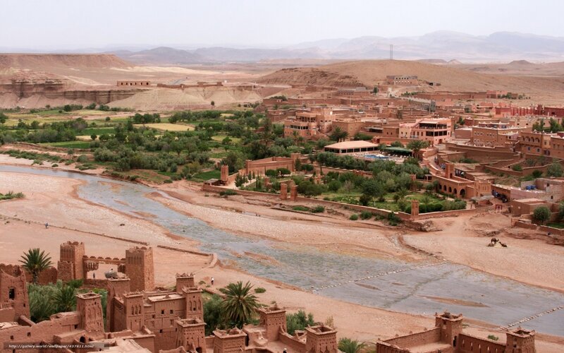 Desert town by river