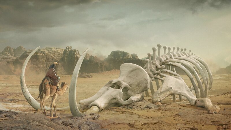 Desert traveler near mammoth skeleton