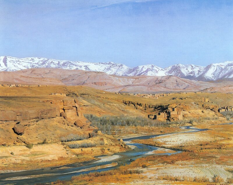 Desert valley with snow-capped mountains