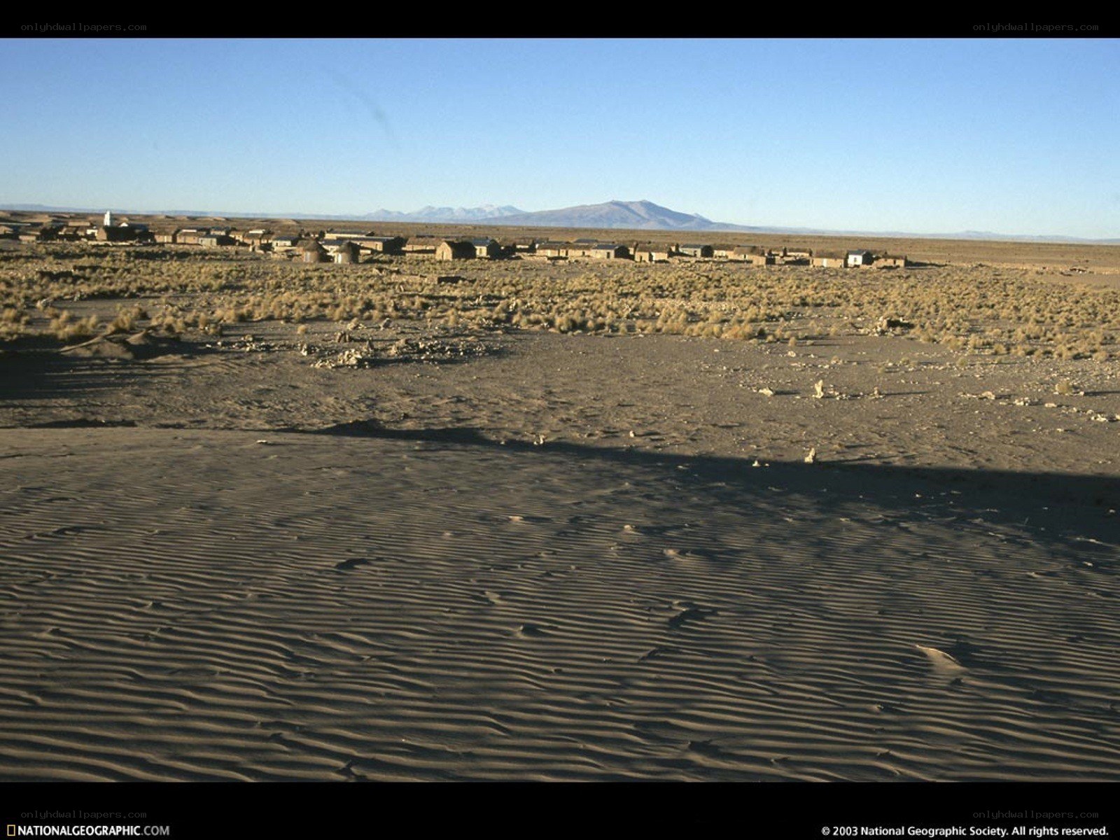 Desert village with mountains
